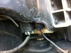 The location of the front bumper bar wiring harness plug