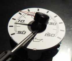 Removing the needle from the gauge face