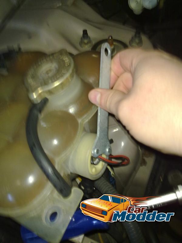 Fitting the low coolant sensor to the coolant overflow bottle